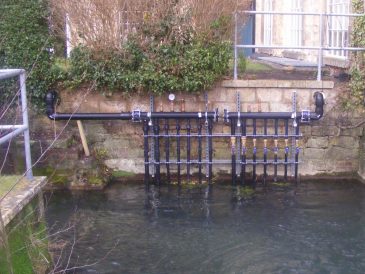 Main flow and return manifolds for the FireFlo collector system with FireFlo panels submerged below
